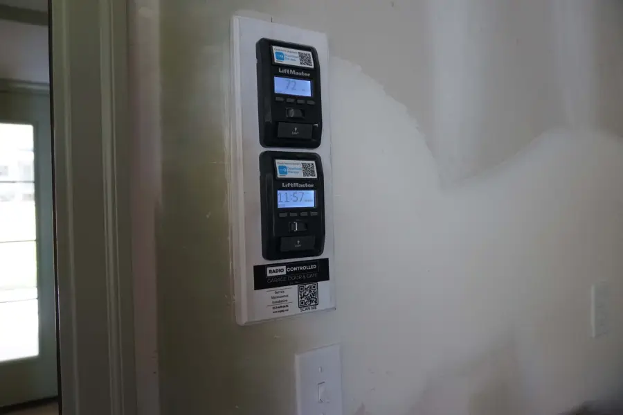 LiftMaster garage door opener controls mounted on a wall