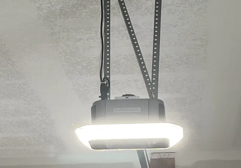 A LiftMaster garage door opener installed on the ceiling
